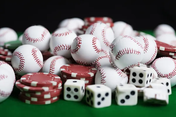 A glowing roulette wheel with cascading chips, symbolizing the engaging live and instant-win games available on BET5666.